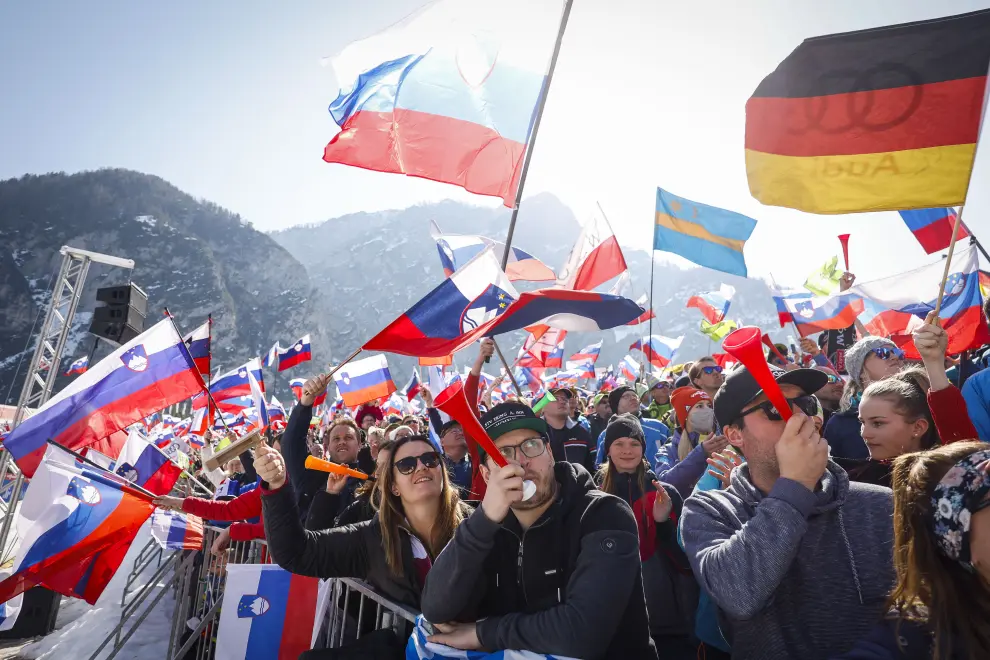 Supporters cheer on ski jumpers at the Ski Flying World Cup finals in Planica. Photo: Anže Malovrh/STA