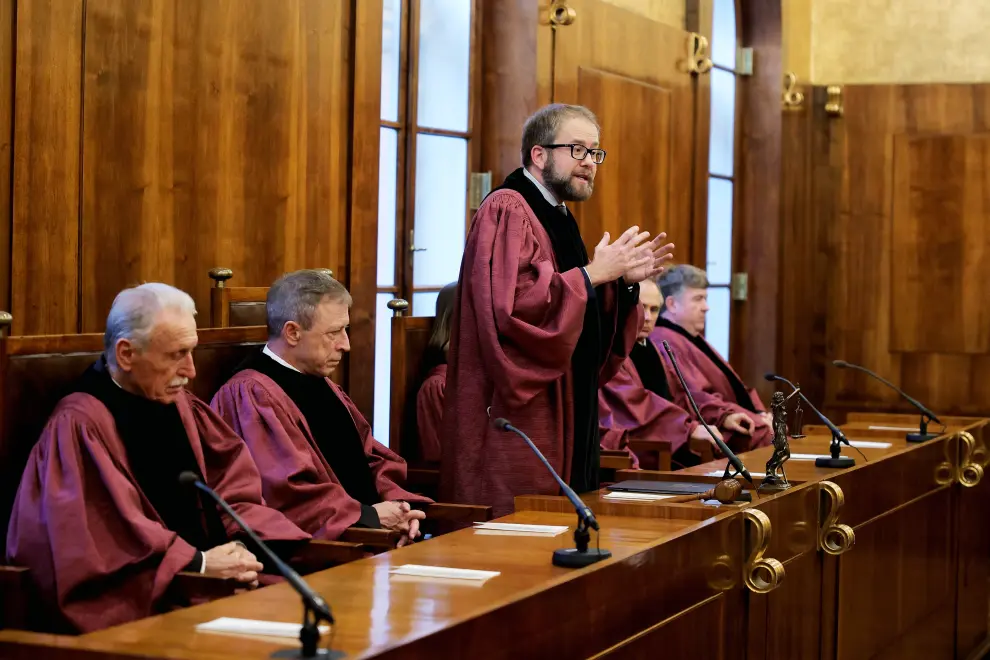 Constitutional court judges with president Matej Accetto delivering an address in December 2022. Photo: Daniel Novakovič/STA