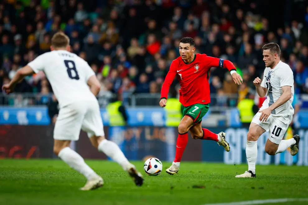 Slovenia defeat Portugal, captained by Cristiano Ronaldo (centre), in a friendly in Ljubljana. Photo: Anže Malovrh/STA
