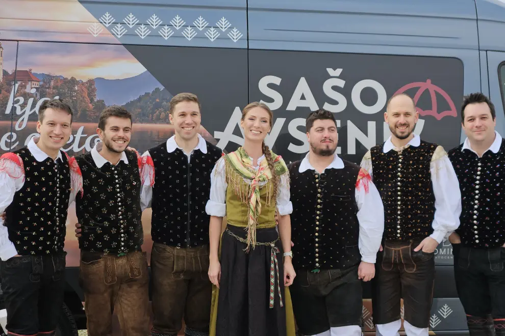 The Sašo Avsenik Enseble in front of their van. Photo: Tinkara Zupan/STA