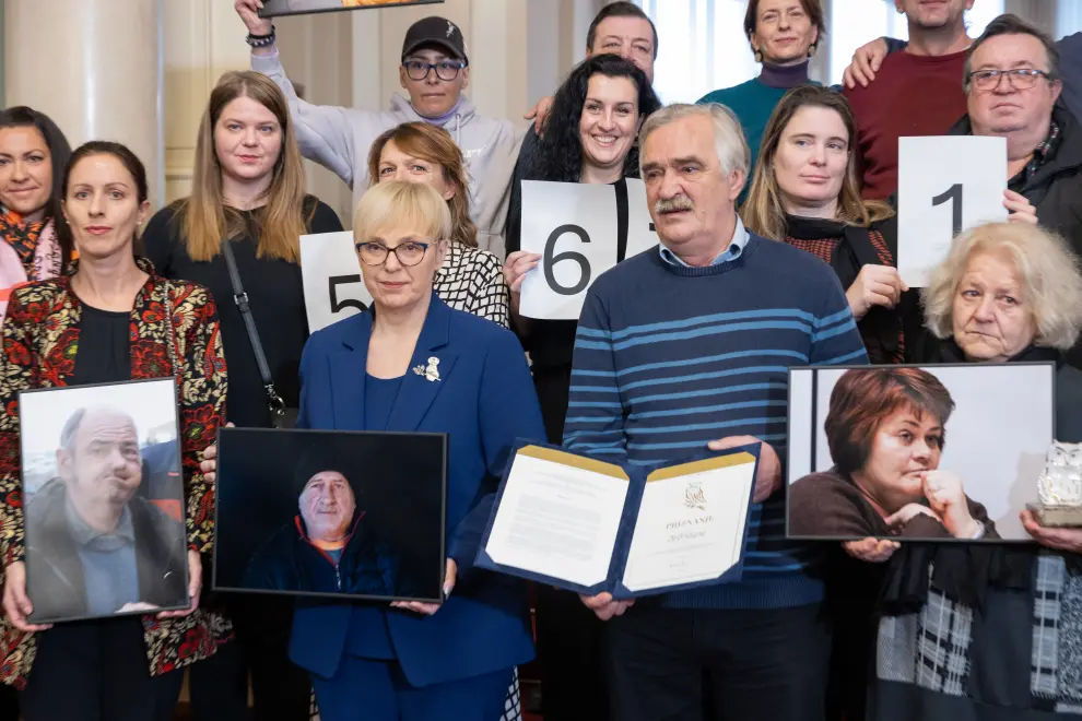 President Nataša Pirc Musar pictured with representatives of the erased as she honours them on Human Rights Day. Photo: Bor Slana/STA