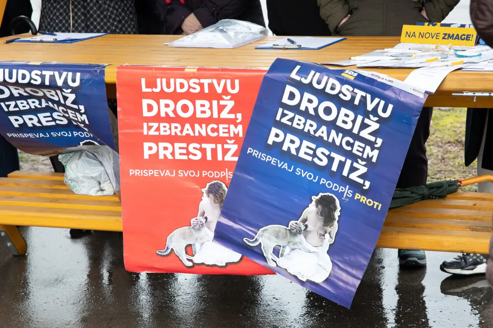 Democratic Party's contentious referendum campaign posters reading pittance for the people, prestige for the select few. Photo: Katja Kodba/STA