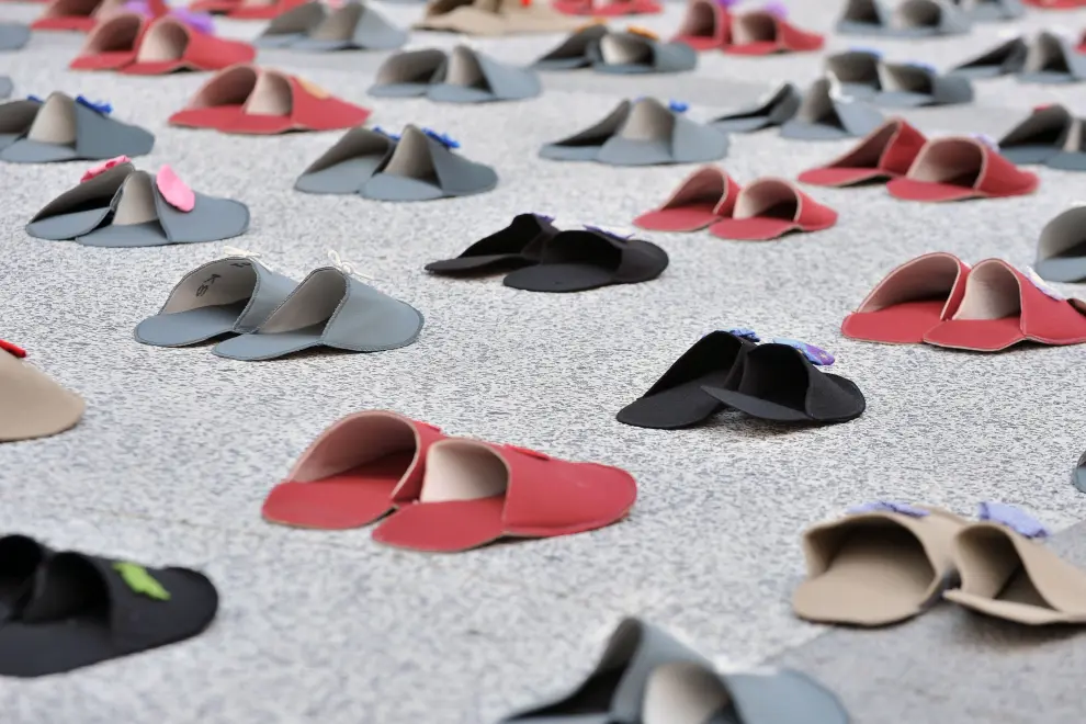 An installation of slippers to commemorate those who committed suicide. Photo: Tamino Petelinšek/STA