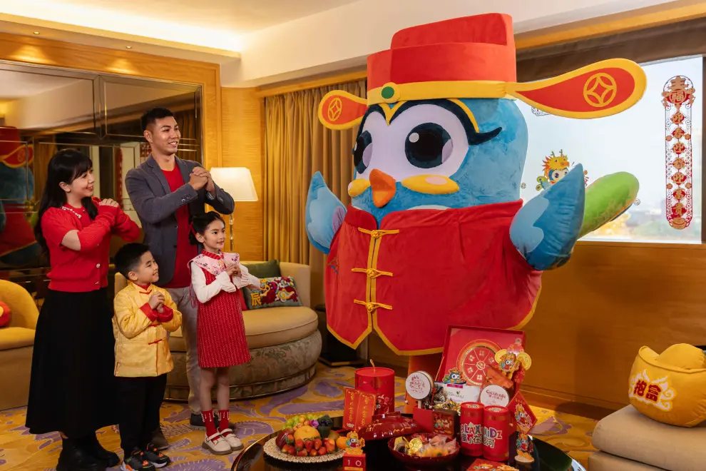 Wavey, the peacock mascot, dressed as the God of Fortune, brings exclusive New Year surprises for the little ones at Galaxy Macau.