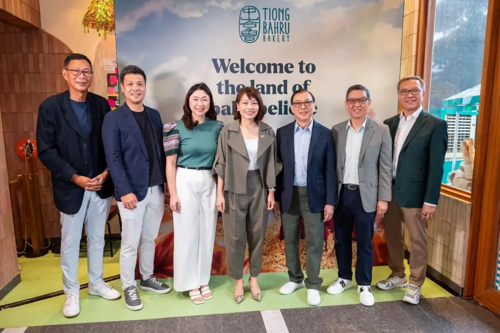 Republic of Singapore's Ambassador to the Philippines, Her Excellency Constance See (center) was among the esteemed guests present at the inauguration of Tiong Bahru Bakery's first international store. Joining Ambassador See in the photo were (L to R) Titan Dining Chairman Peter Tan, Titan Dining Director Damien Lim, Taguig City Philippines Mayor Lani Cayetano, Jollibee Group Founder and Chairman Dr. Tony Tan Caktiong, Jollibee Group Global President and Chief Executive Officer Ernesto Tanmantiong, and Jollibee Group Philippines Chief Executive Officer Joseph Tanbuntiong.