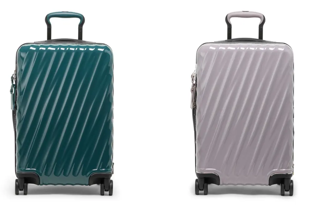 (L to R): 19 Degree International Expandable 4 Wheeled Carry-On in Lagoon and Lavender