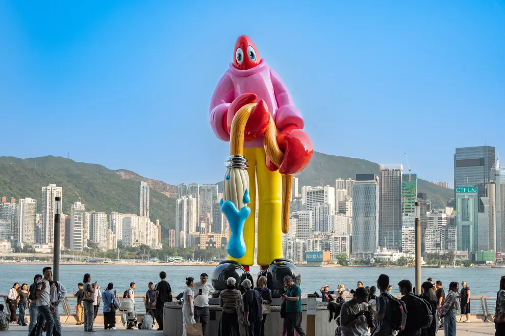 British neo-pop artist, Philip Colbert, unveils his monumental sculpture, THE LOBSTER PAINTER, at the promenade at K11 MUSEA during Hong Kong Arts Month (Photo Credit: Anthony Kwan, Getty Images)